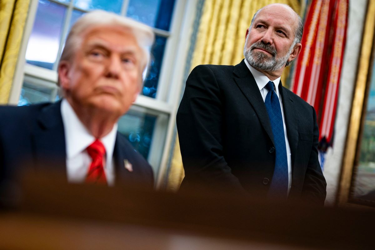 Howard Lutnick and President Donald Trump during an executive order signing in the Oval Office on Feb. 10. Photographer: Al Drago/Bloomberg