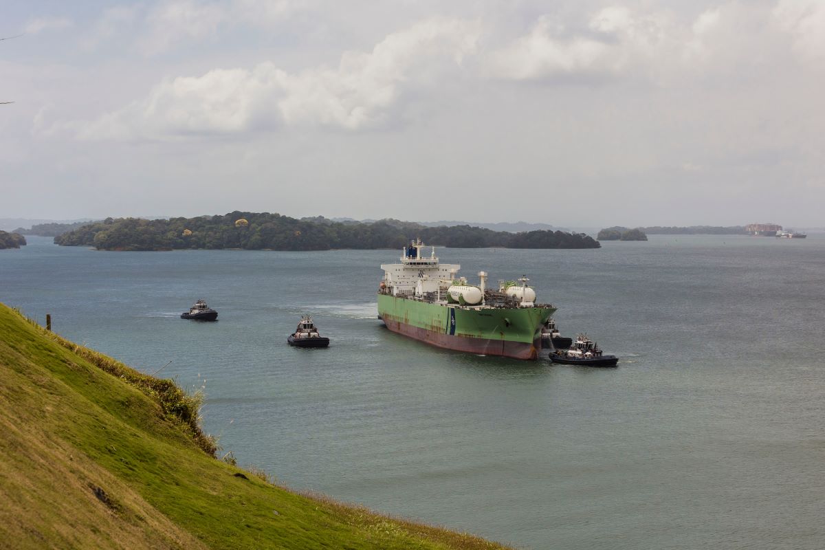 A vessel is guided through the Panama Canal. The Panama Canal’s vulnerability to drought recently caused long wait times and costly disruptions for shippers. Photographer: Tarina Rodriguez/Bloomberg