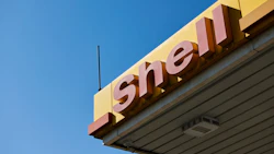 A Shell logo outside a gas station. Photographer: Waldo Swiegers/Bloomberg