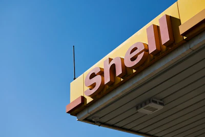 A Shell logo outside a gas station. Photographer: Waldo Swiegers/Bloomberg