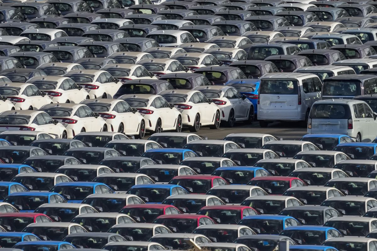 Honda Motor Co. vehicles bound for shipment at a port in Yokohama, Japan. Cars and car parts account for about a third of Japan’s total exports to the U.S. Photographer: Toru Hanai/Bloomberg