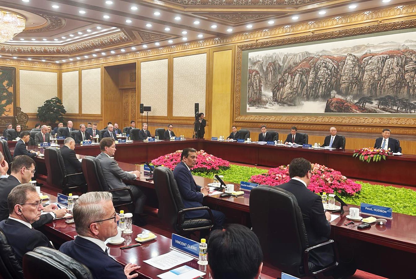 Xi Jinping, far right, meets with global business leaders in Beijing. Photographer: Philip Glamann/Bloomberg
