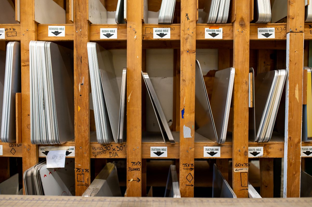 Cut aluminum signs at a manufacturing facility in Langford, British Columbia. Photographer: James MacDonald/Bloomberg