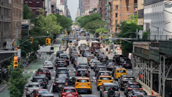 Traffic on 10th Avenue in Manhattan in 2024. Photographer: Jeenah Moon/Bloomberg