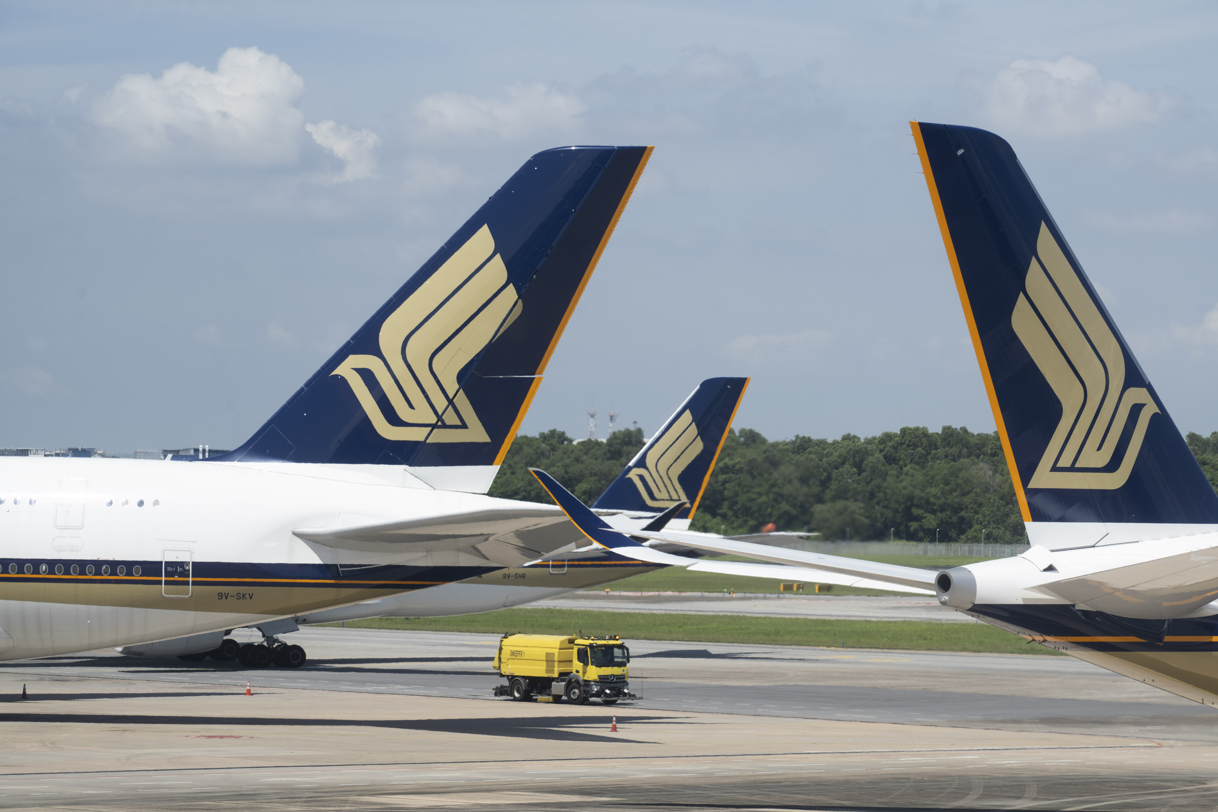 Singapore Airlines Ltd. aircraft at Changi Airport in Singapore. Photographer: Ore Huiying/Bloomberg