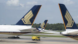 Singapore Airlines Ltd. aircraft at Changi Airport in Singapore. Photographer: Ore Huiying/Bloomberg