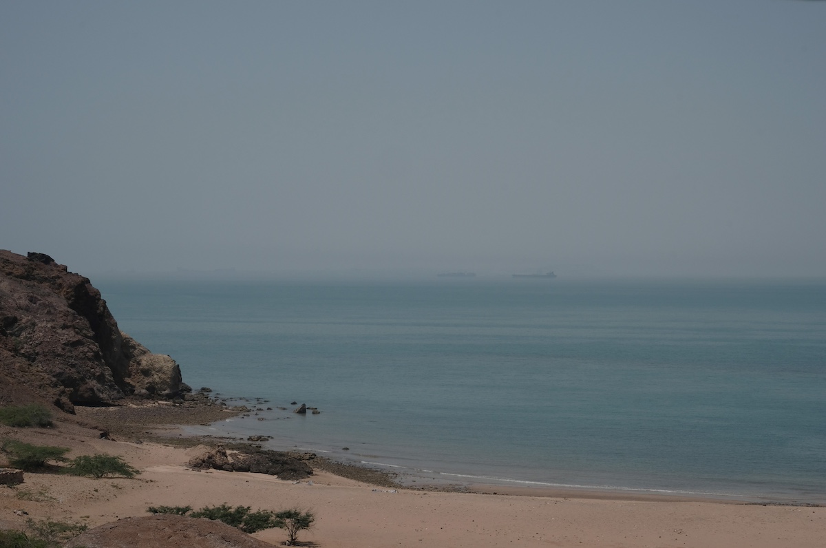 Two oil tankers are seen at a distance in the waters of Strait of Hormuz in Hormuz Island, Iran. Photo: Kaveh Kazemi / Getty Images via Bloomberg.