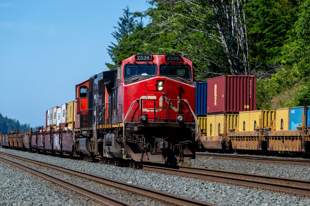A Canadian National Railway Co. locomotive and rail cars along the connector route at the Port of Prince Rupert in British Columbia. Photographer: James MacDonald/Bloomberg