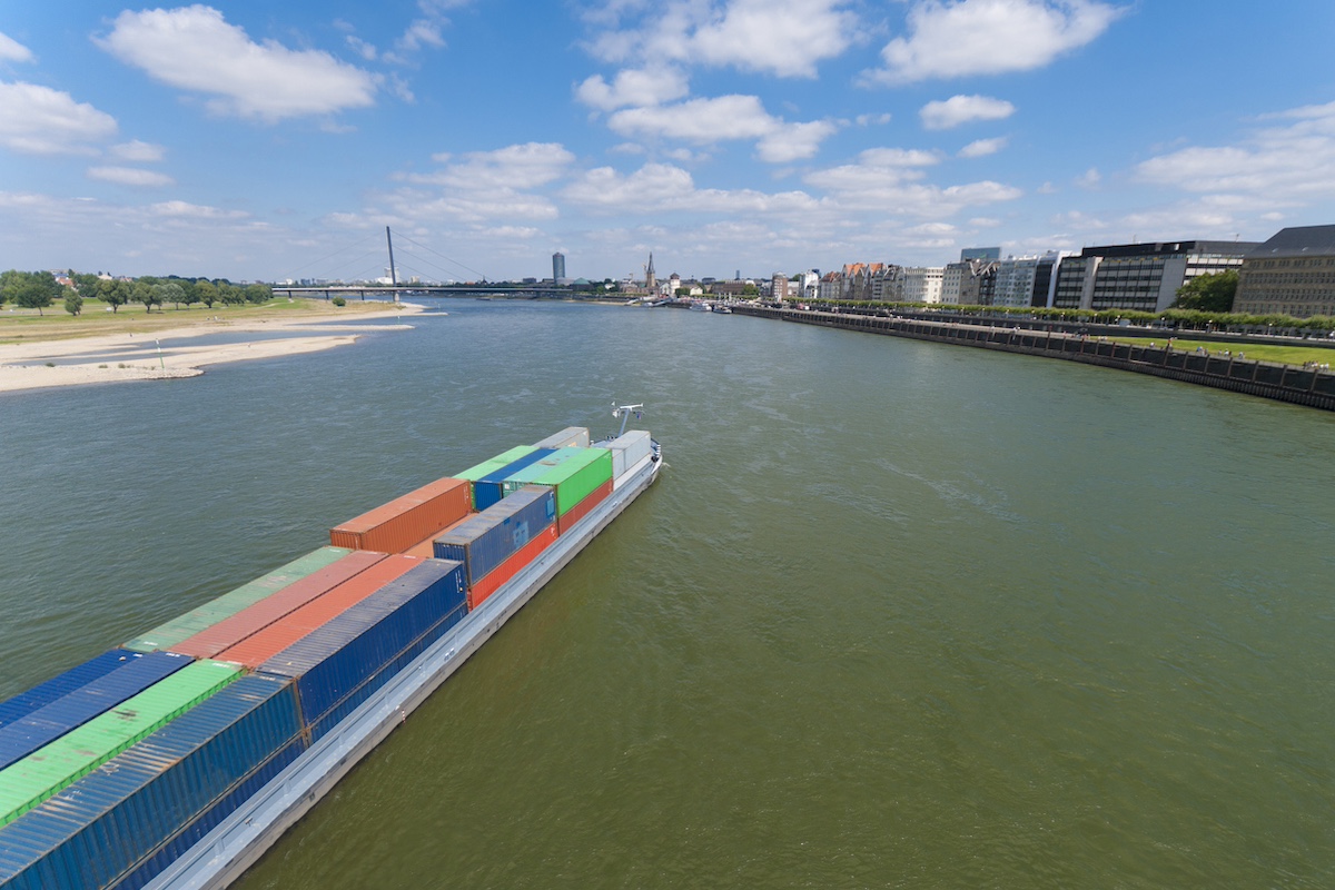 A barge transiting Germany's Rhine River through Dusseldorf. Photo: iStock / hansenn