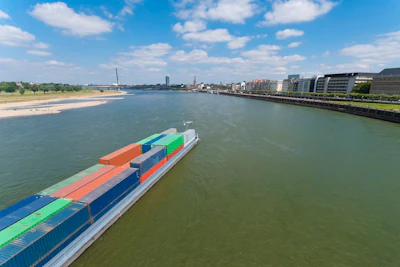 A barge transiting Germany's Rhine River through Dusseldorf. Photo: iStock / hansenn