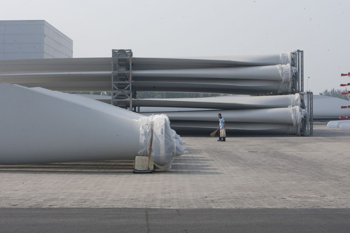 Wind turbine blades at a factory in China. Photographer: Nelson Ching/Bloomberg