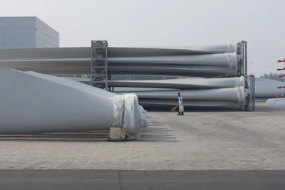 Wind turbine blades at a factory in China. Photographer: Nelson Ching/Bloomberg