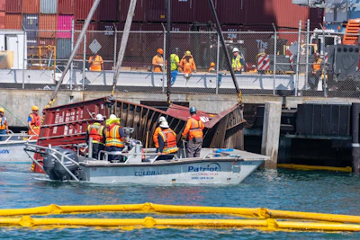 Salvage crews recovering containers that fell into the water at the Port of Long Beach. Photo: U.S. Coast Guard