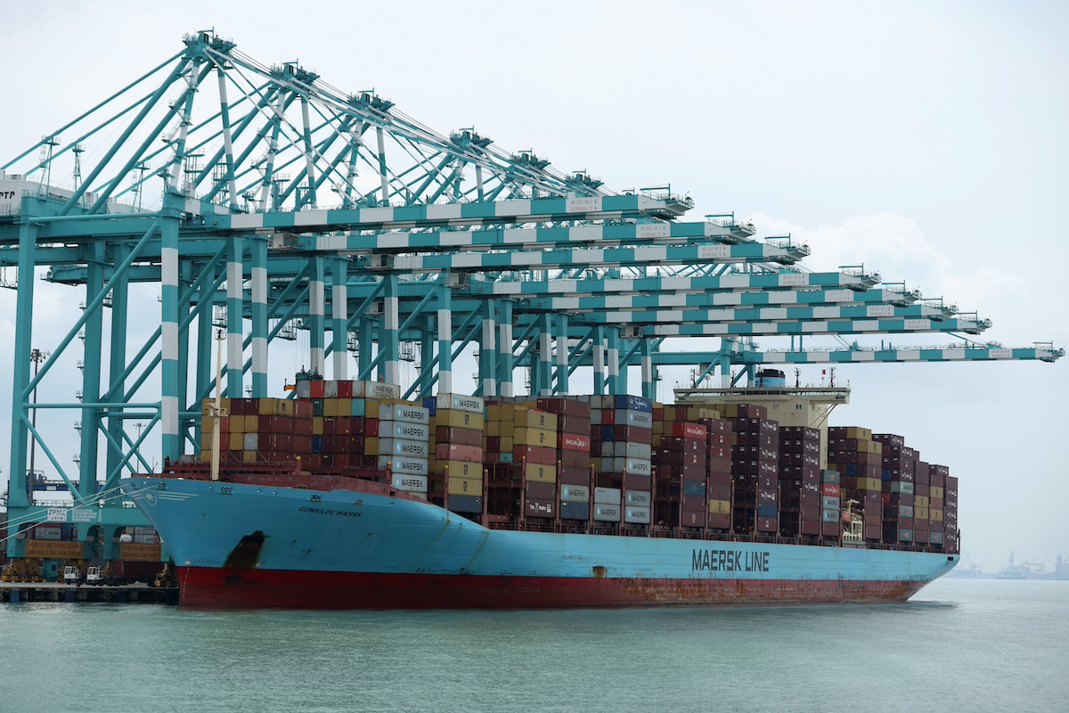 A container ship docked in Johor, Malaysia. Photographer: Lionel Ng/Bloomberg