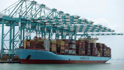 A container ship docked in Johor, Malaysia. Photographer: Lionel Ng/Bloomberg