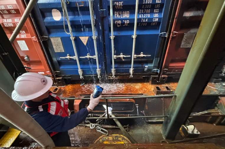 Crews, under the Unified Command, continue their response operations Nov. 25, after a fire occurred aboard a container vessel at the Port of Los Angeles. Photo: Port of Los Angeles