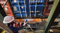 Crews, under the Unified Command, continue their response operations Nov. 25, after a fire occurred aboard a container vessel at the Port of Los Angeles. Photo: Port of Los Angeles