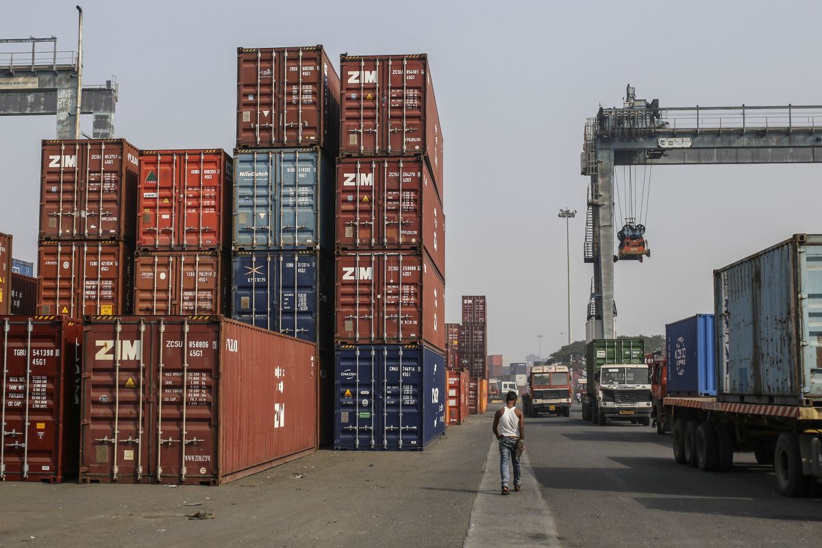 Stacked shipping containers at the Jawaharlal Nehru Port in Navi Mumbai, Maharashtra, India. Photographer: Dhiraj Singh/Bloomberg