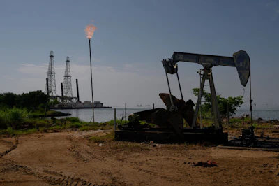 An oil pumpjack on Lake Maracaibo in Cabimas, Zulia state, Venezuela. Source: Bloomberg