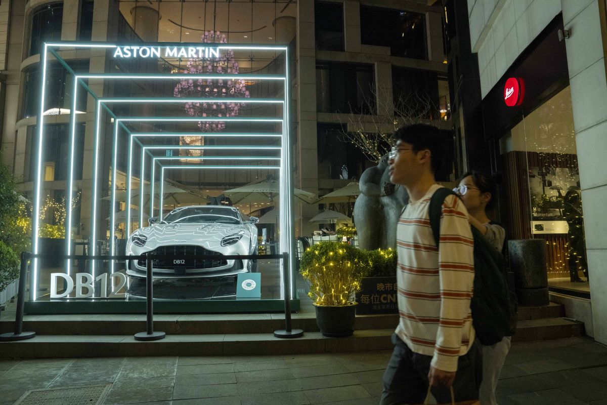 An Aston Martin DB12 vehicle on display in the Xintiandi shopping area in Shanghai. Photographer: Raul Ariano/Bloomberg