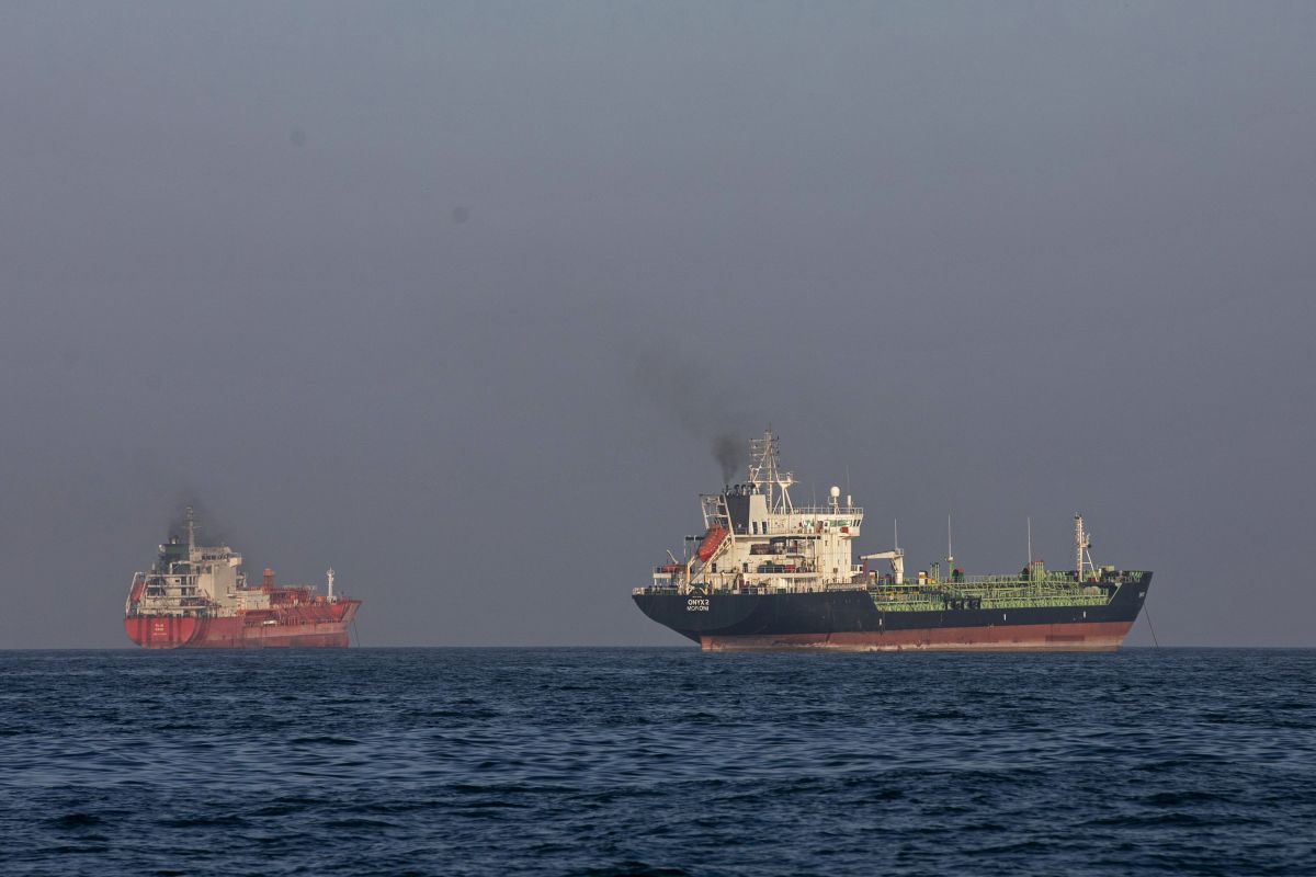 Ships anchored in the Strait of Hormuz near Larak Island, Iran on May 16. Photographer: Majid Saeedi/Getty Images