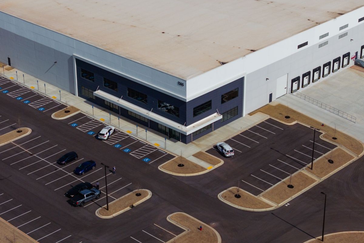 DHS vehicles outside an industrial warehouse purchased by ICE for use as a detention center in Social Circle, Georgia on Feb. 10. Photographer: Elijah Nouvelage/Getty Images