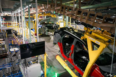 Automobile body shells on the vehicle production line at the Nissan Motor Co. manufacturing plant in Sunderland, UK. Photographer: Ian Forsyth/Bloomberg