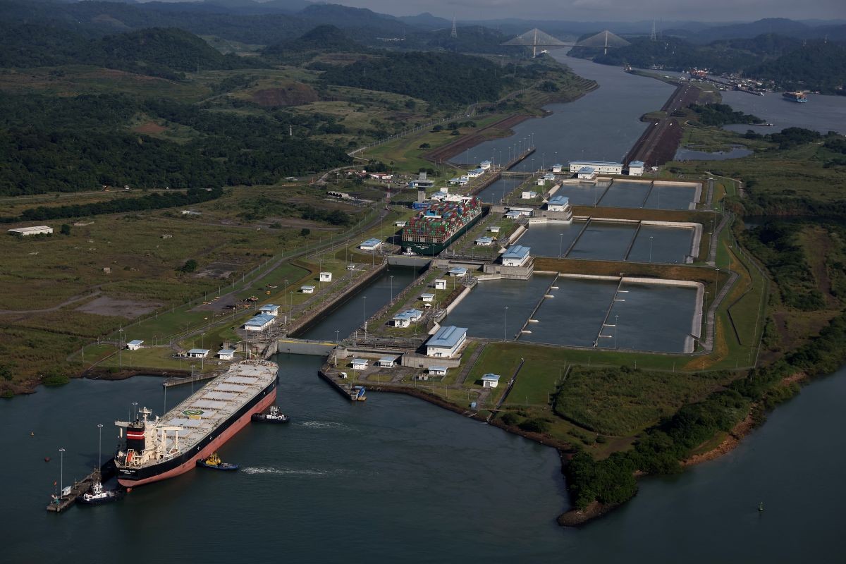 A container ship passes through the Miraflores Locks as it transits the Panama Canal. Photographer: Justin Sullivan/Getty Images