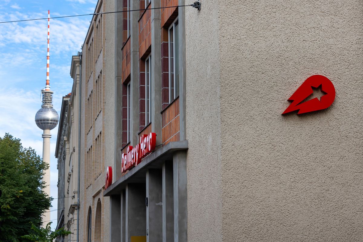 Signage for Delivery Hero SE at the company's office in Berlin. Photographer: Krisztian Bocsi/Bloomberg