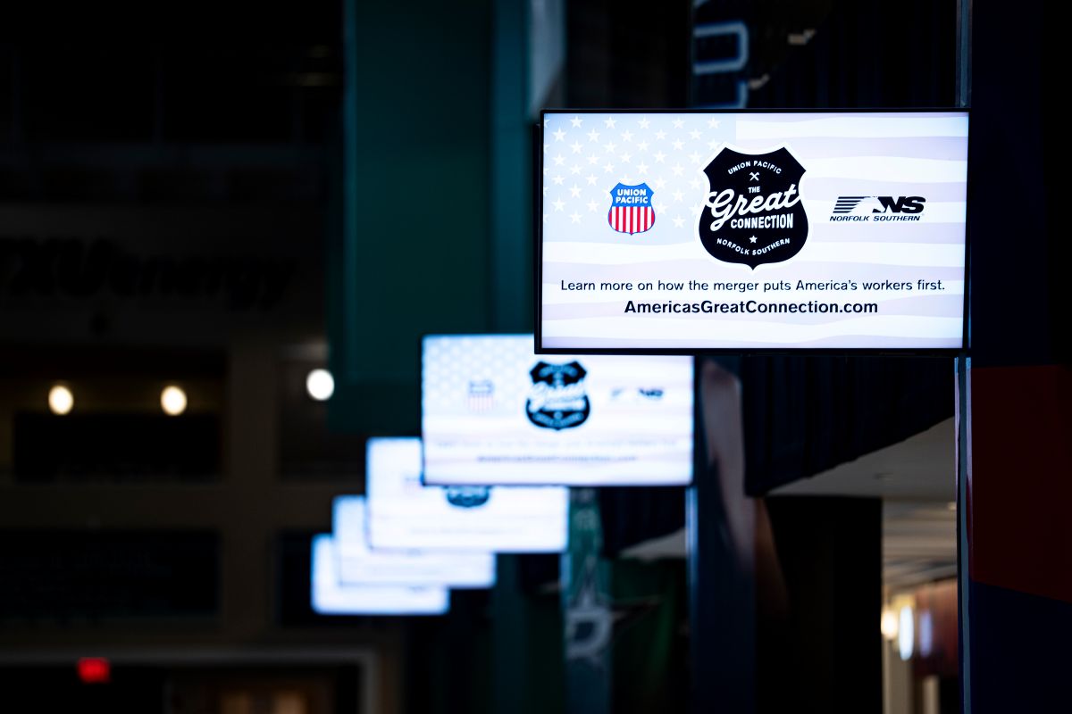 Signage for the potential Union Pacific and Norfolk Southern merger inside the American Airlines Center ahead of the Republican Midterm Convention in downtown Dallas on Sept. 8. Photographer: Al Drago/Bloomberg