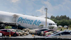 An Amazon.com cargo plane on Sept. 7, one day after it overran the runway at Miami International Airport in Miami. Photographer: Joe Raedle/Getty Images