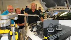 Jerry Snyder of JES Sales demonstrating the Spanesi TOUCH Electronic Measuring System at an event at CARSTAR Vision Park in Hamilton. INSET: Snyder's two awards from Spanesi.
