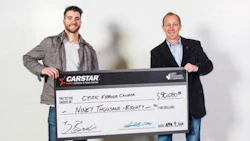 Calgary Flames Defenceman TJ Brodie and Mike Piper, CARSTAR Canada Western Region Director.