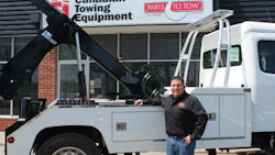 A staff member demonstrates a truck's features at the open house event. Check out the gallery below for more photos!