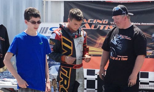 Nathan Goncalves (left) presents this year&rsquo;s donation cheque to Austin Riley and his father, Jason Riley.