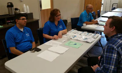 Representatives of CSN-427 Auto Collision interviewing a prospective employee at the Pre-apprenticeship Career Fair in 2015. A number of employers have already signed up for this year's event, but booth space is still available.