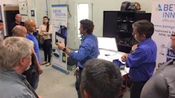 A demo by BETAG Innovations draws a crowd at the event held at the Color Compass training centre.