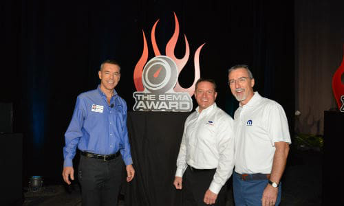 The 2015 SEMA Award for Hottest Car for the Ford Mustang, Hottest Truck for the Ford F-Series and Hottest Sport Compact for the Ford Focus was presented by SEMA President and CEO Chris Kersting (left) to Global Director Ford Performance Dave Pericak (centre). The SEMA Award for Hottest 4&times;4-SUV went to Jeep for the Jeep Wrangler, and was presented to Pietro Gorlier (right), head of Mopar.