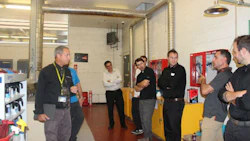Dave Samalea of Centennial College conducts a tour of the school's autobody labs. Centennial College served as host for the Toyota Collision Repair Conference.