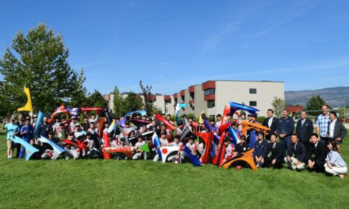 Students from Toyoto Technical College and officials from from Okanagan College and Toyota Technical College gather to celebrate the 25th anniversary of the program that sees Japanese students travel to Canada for collision repair training.