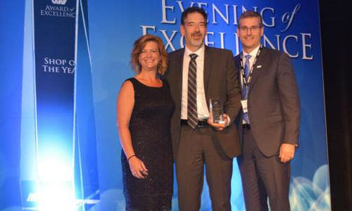 Gary Laschuk of CSN-Reflections accepts the award for CSN Shop of the Year from Alberta Regional Manager Kari Barton and Manager of Network Performance Mark Roesch (right).