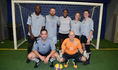 The team from Unifund (above) took home the cup at the conclusion of the tournament. Check out the gallery below for more photos!