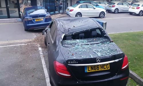 Tesla Crashes into mercedes shop