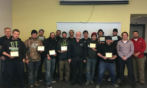 The graduation class from Fanshawe College, with well-wishers Mike Kennelly, John Norris and Craig Alvaro.