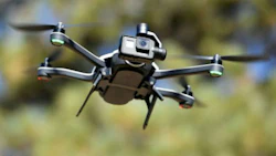 Ford is examining the possibility of using flying drones, launched from an autonomous vehicle, that would help the self-driving car navigate.