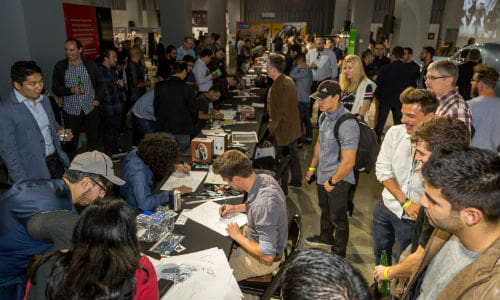 The crowd watches as design contestants engage in a sketch competition at the 2016 Middlecott Sketchbattle Los Angeles presented by BASF.