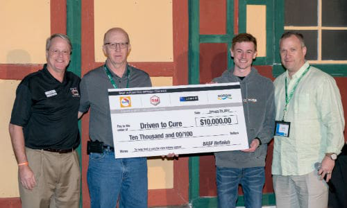 BASF presents a $10,000 cheque to Andrew and Bruce Lee of Driven to Cure. From left: Bruce Lee of DTC, Marvin Gillfillan of BASF, Andrew Lee of DTC and Dan Bihlmeyer of BASF.