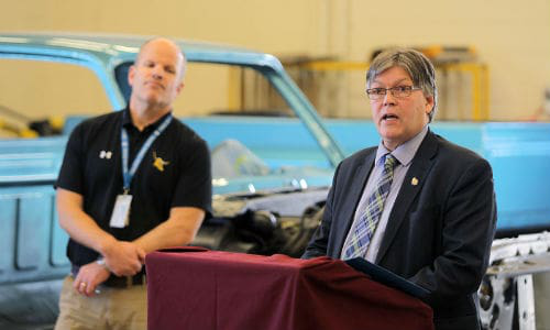 Manitoba&rsquo;s Education and Training Minister, Ian Wishart, announced that the province would commit $347,453 to Crocus Plains Regional Secondary School&rsquo;s collision program. The school&rsquo;s principal is Chad Cobbe (right). Photo by the Brandon Sun.