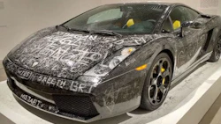 An art piece entitled 'Low Key' on display at a museum in Denmark. Patrons were encouraged to leave their mark on a once-pristine Lamborghini.