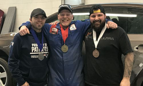 Newfoundland's Autobody Repair gold medalist Robert Hulan (centre) with silver medalist Patrick Noseworthy (left) and bronze medalist Jonathan Payne (right). All three are students at College of the North Atlantic in St. John&rsquo;s.